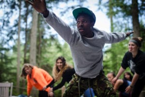 A camper participates in a group activity at Partners for Youth's Power of Hope Camp